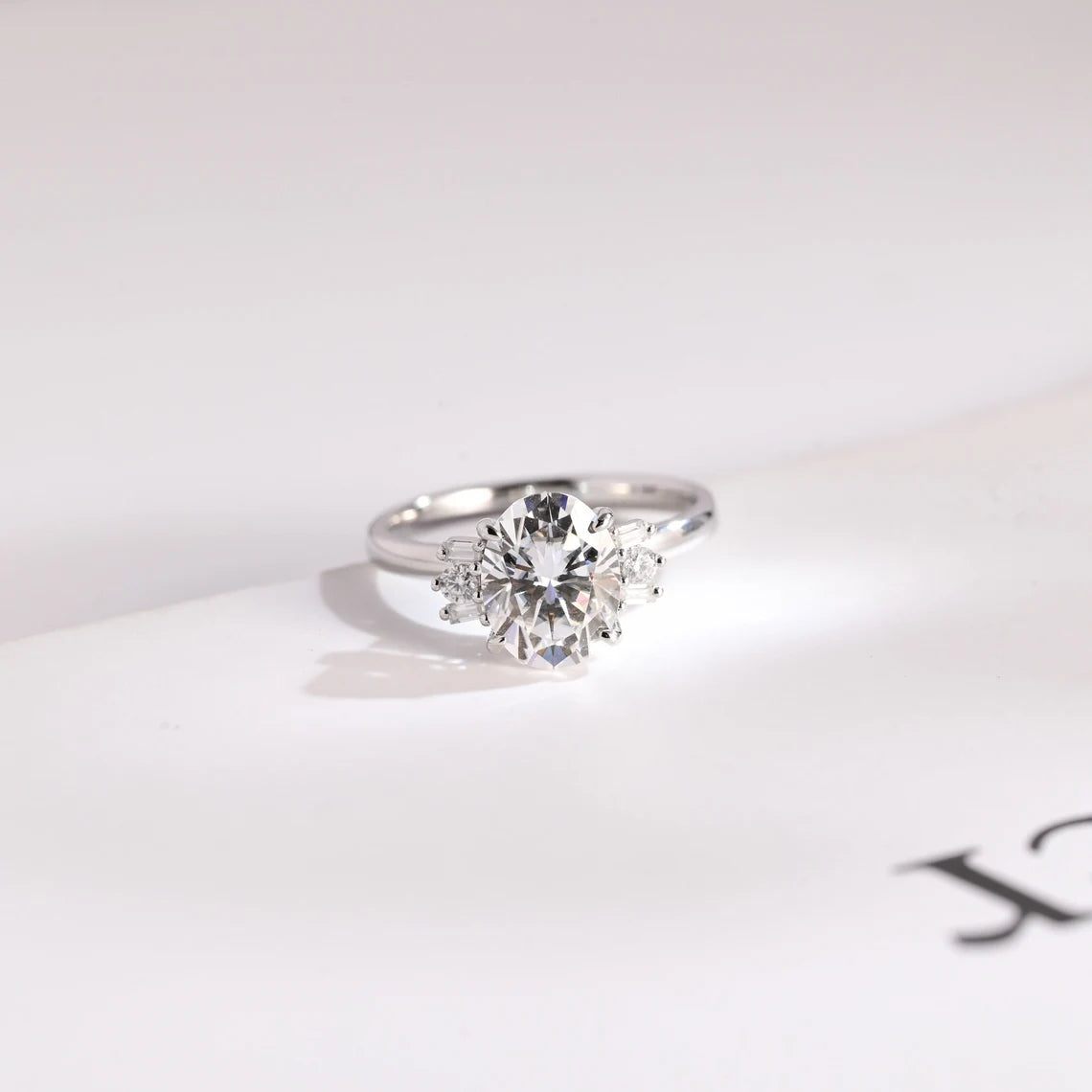 Baguette & Round Side Stone Ring
