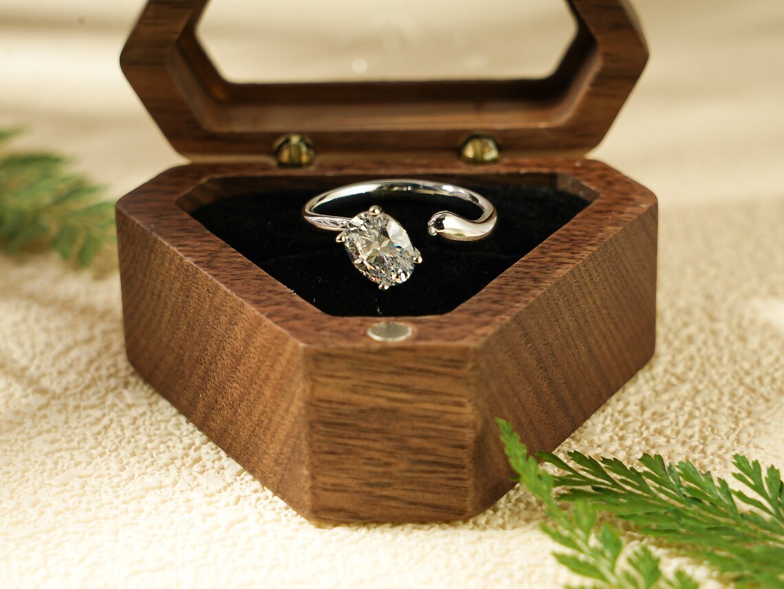 East-west oval cut diamond ring with prong setting in solid gold. A modern minimalist engagement ring for her — elegant, handmade, and full of sparkle.

