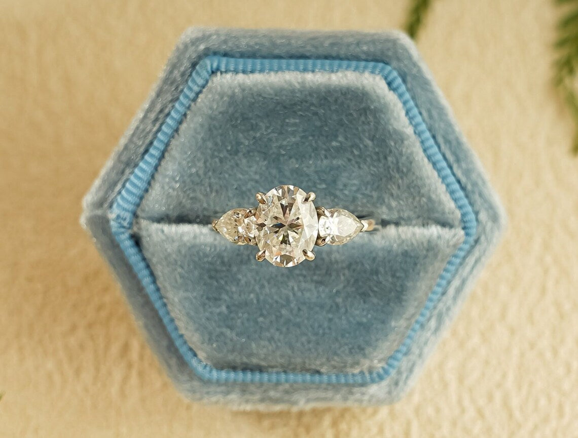 Three stone engagement ring