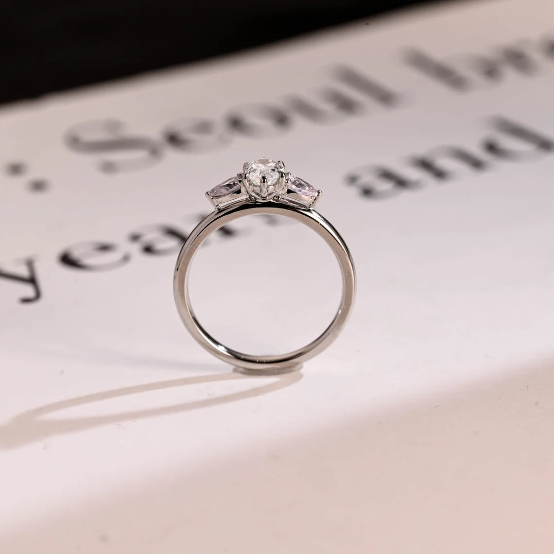 Pear side stone ring