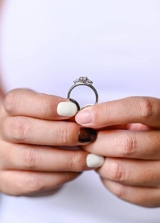 Three stone engagement ring