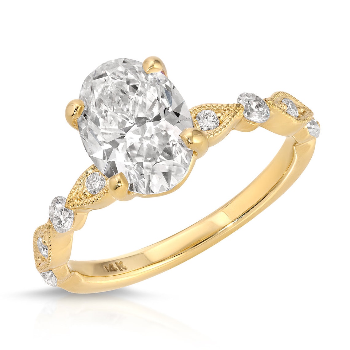 Oval cut lab grown diamond engagement ring with vintage milgrain detailing in yellow gold. A romantic heirloom-style ring with timeless elegance.