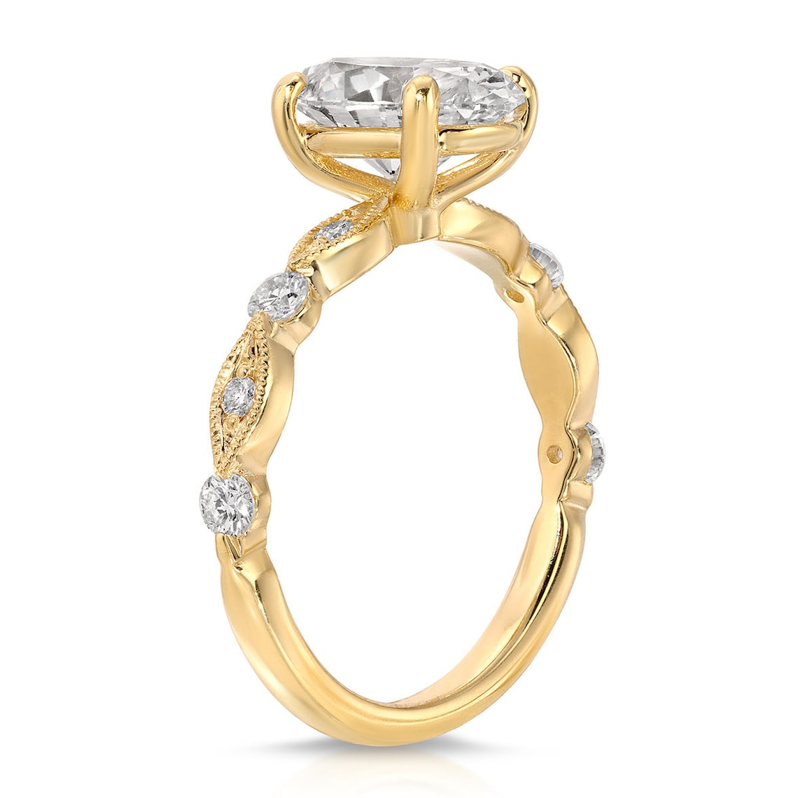 Oval cut lab grown diamond engagement ring with vintage milgrain detailing in yellow gold. A romantic heirloom-style ring with timeless elegance.
