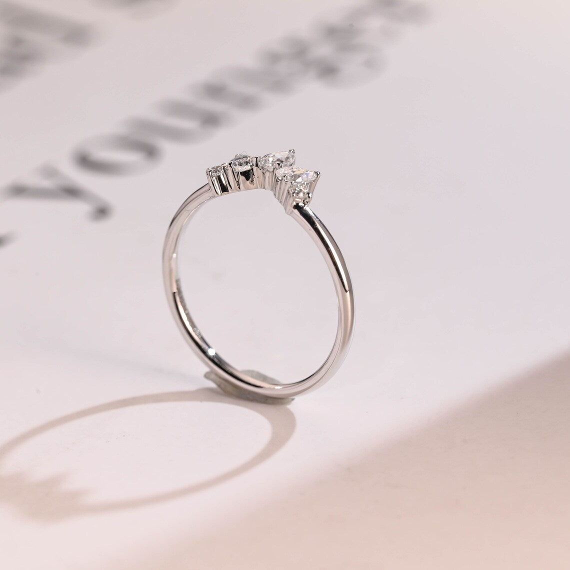 Curved v shape ring