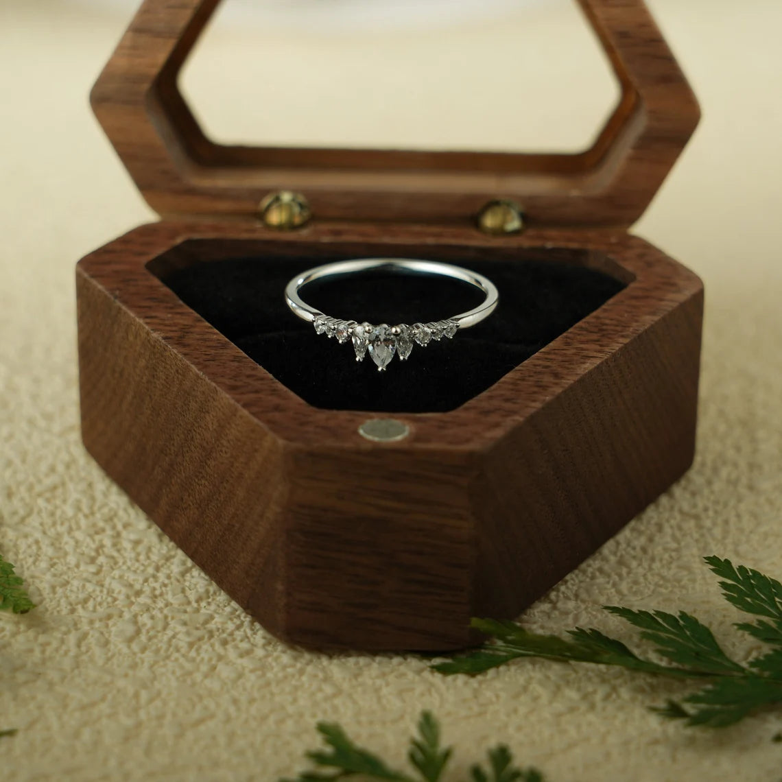 Pear cut moissanite band