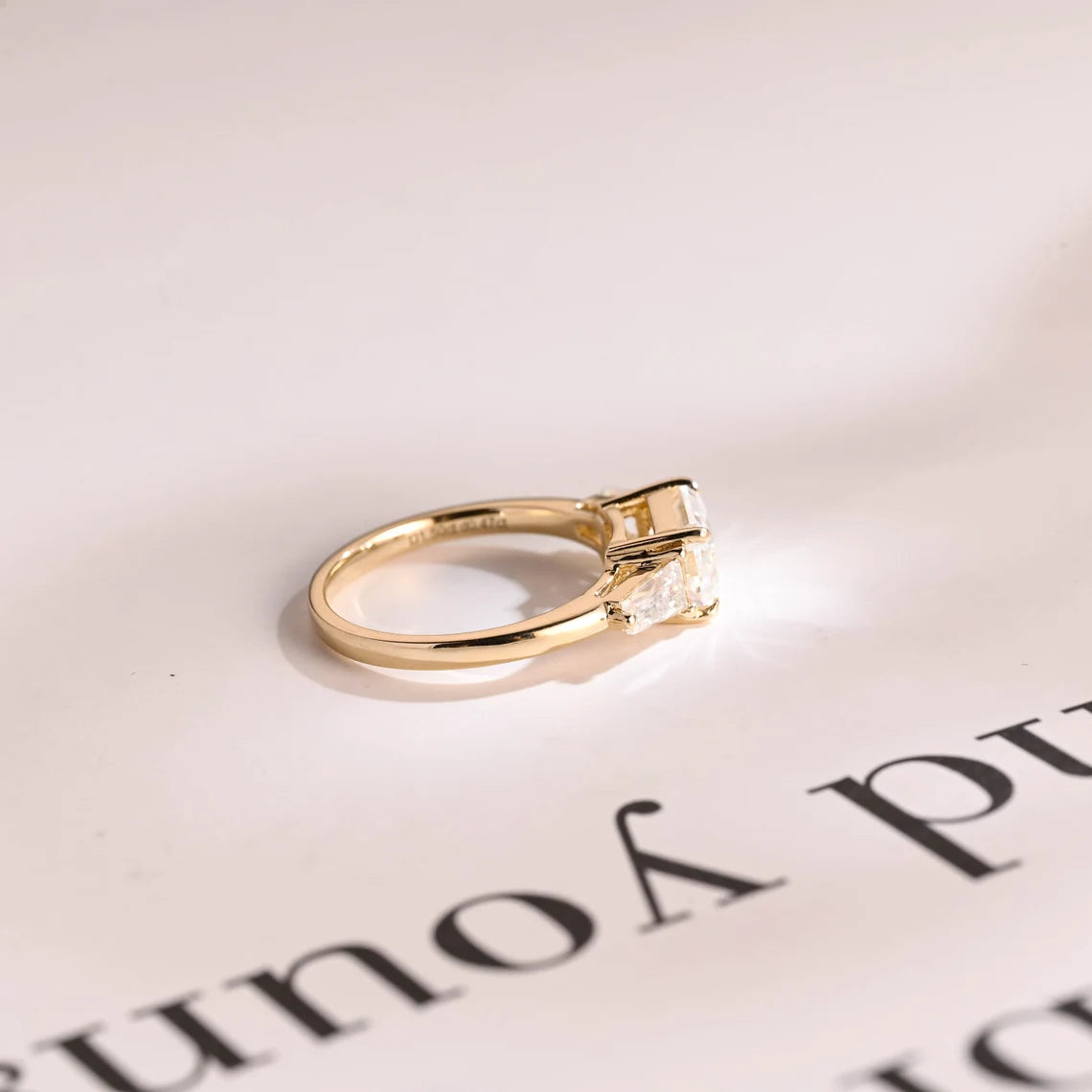 Three stone engagement ring