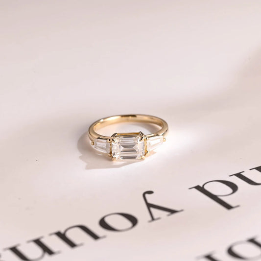 Emerald cut moissanite ring