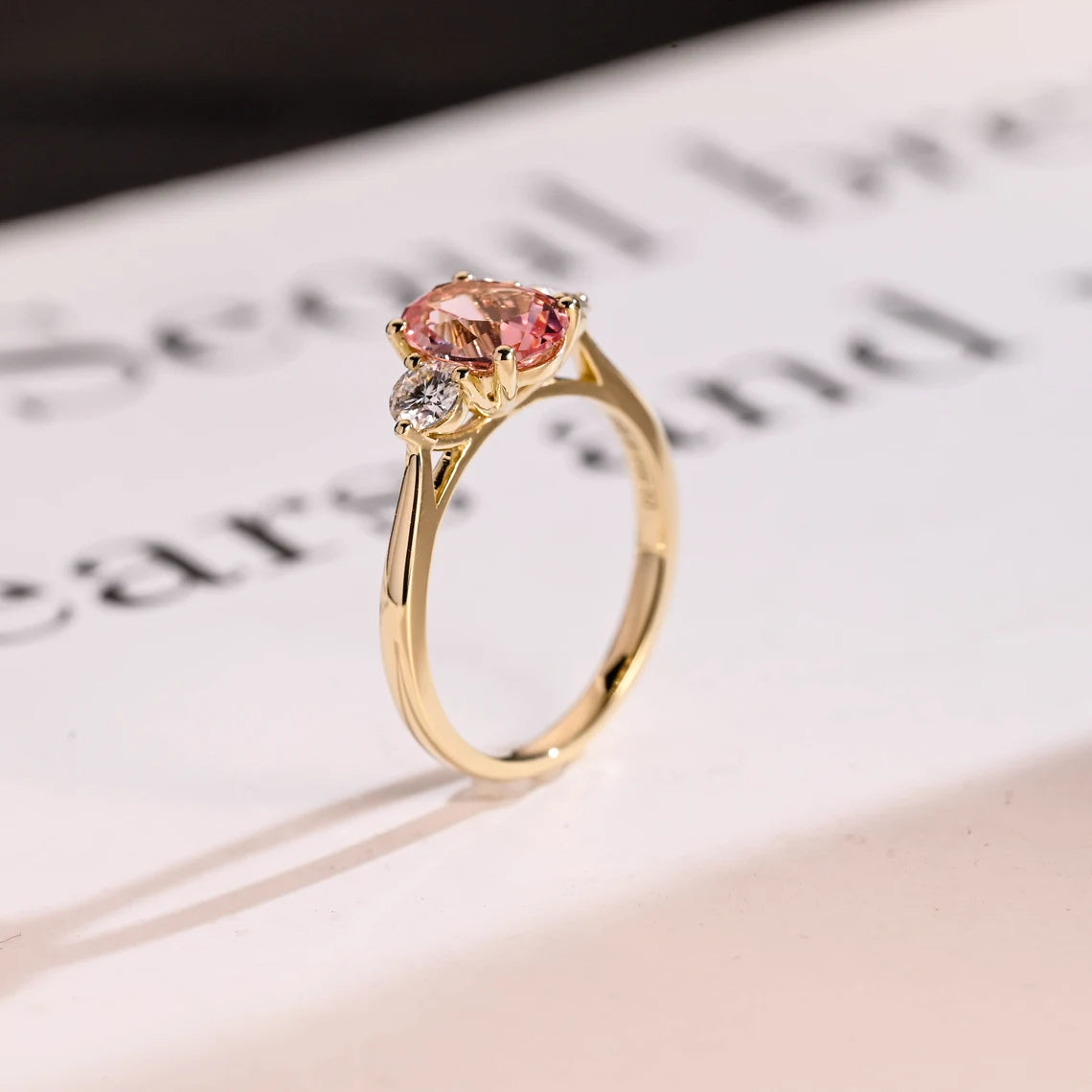 Round side stone moissanite ring