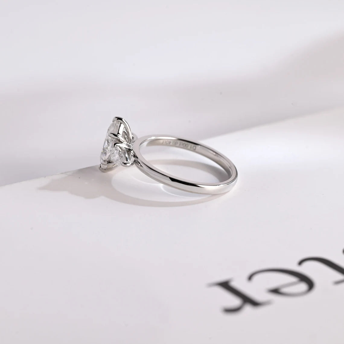 Straight shank solitaire ring
