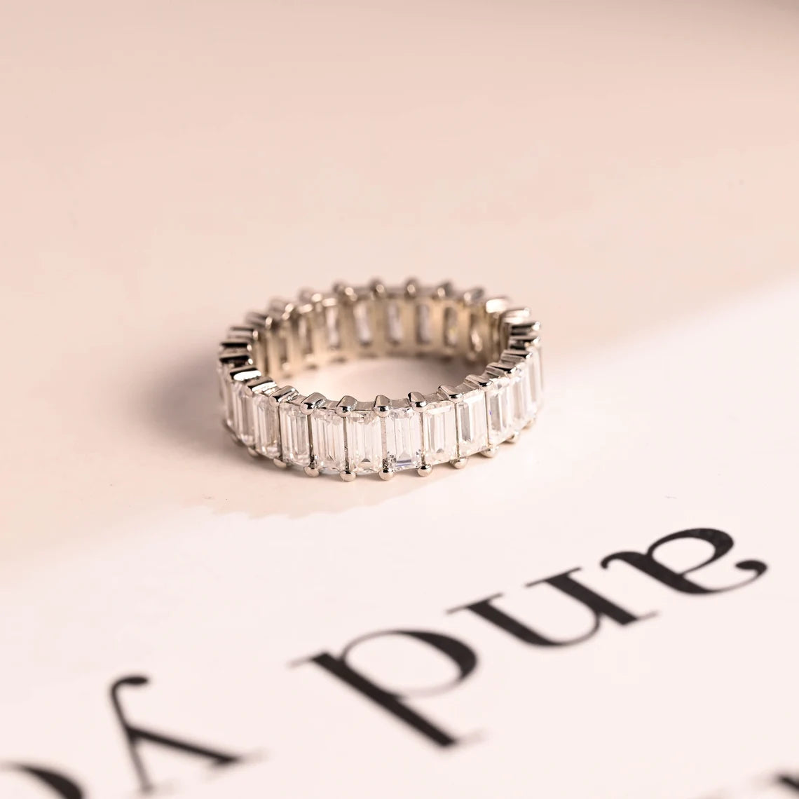 Emerald cut moissanite ring