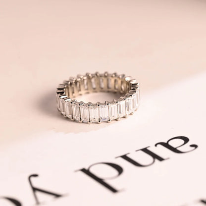 Emerald cut moissanite ring
