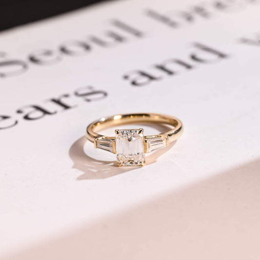 Three stone engagement ring
