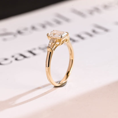 Emerald cut moissanite ring