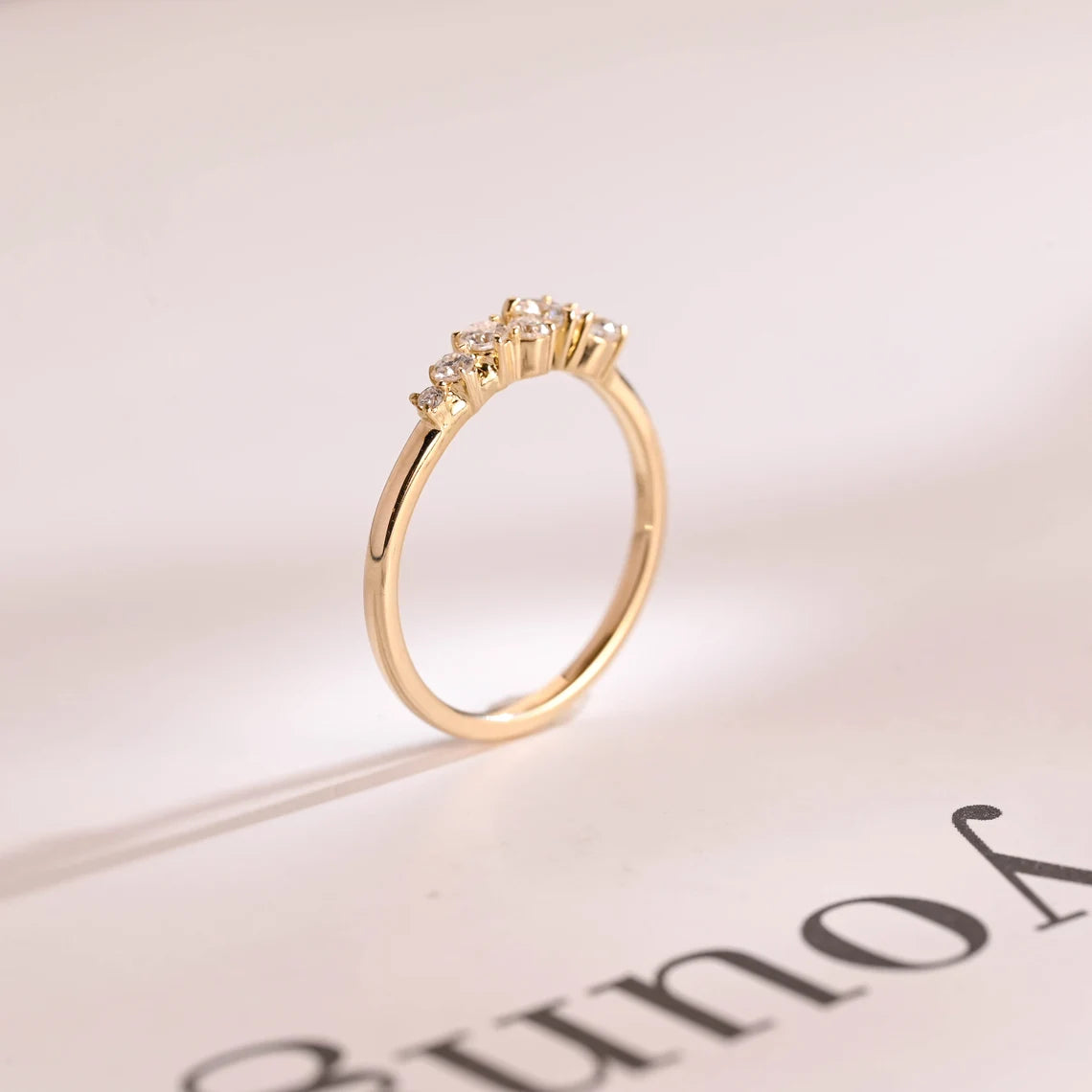 Moissanite cluster band