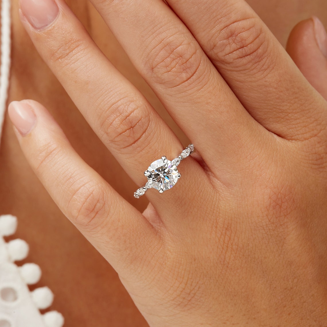 Marquise side stone pave ring