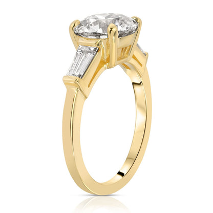 Three stone engagement ring