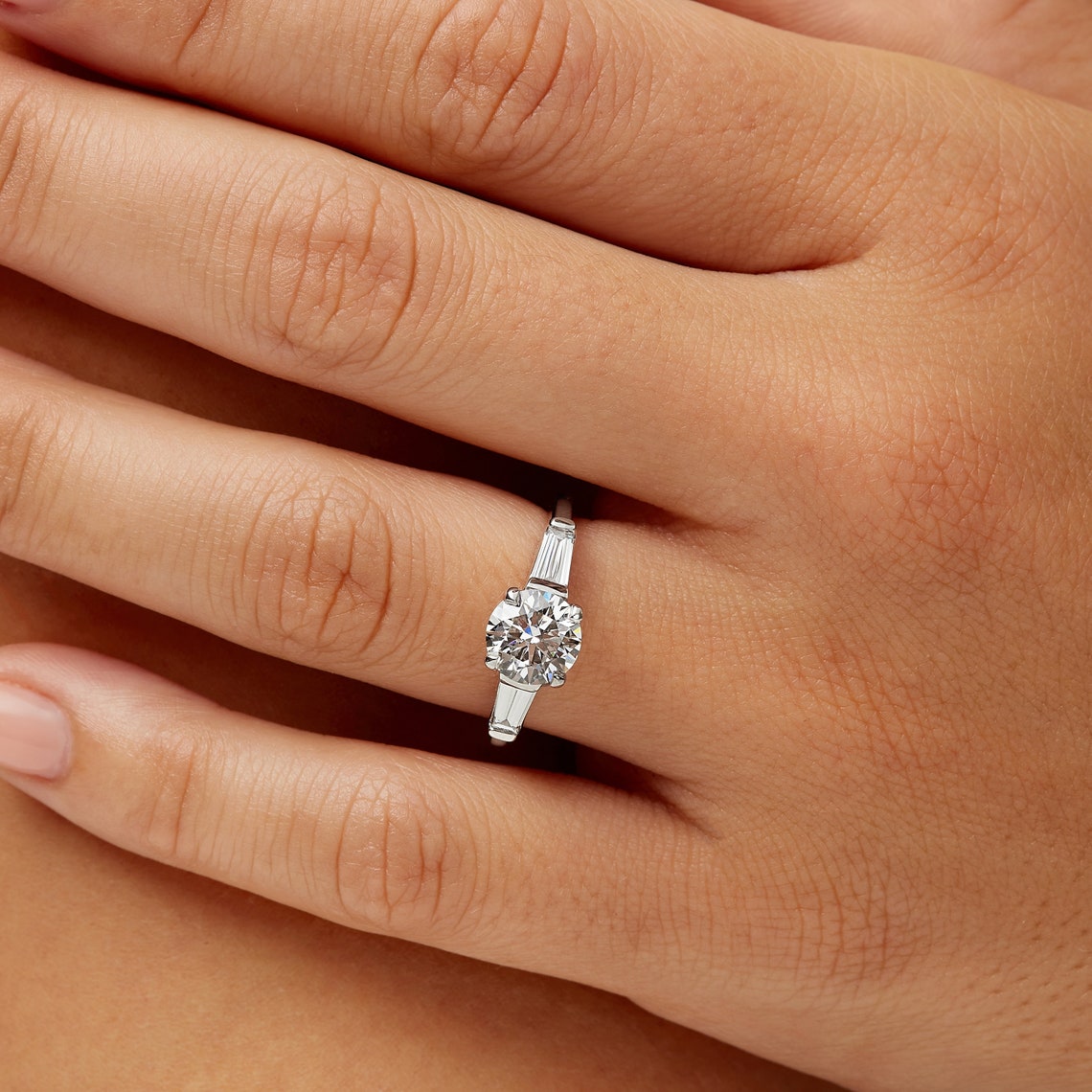 Three stone engagement ring