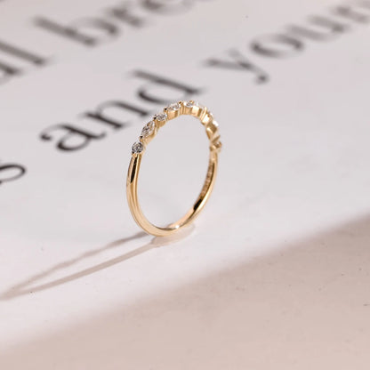 Half eternity moissanite ring