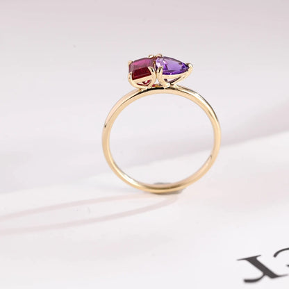 Red emerald cut moissanite ring