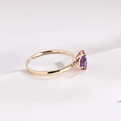 Yellow gold moissanite ring