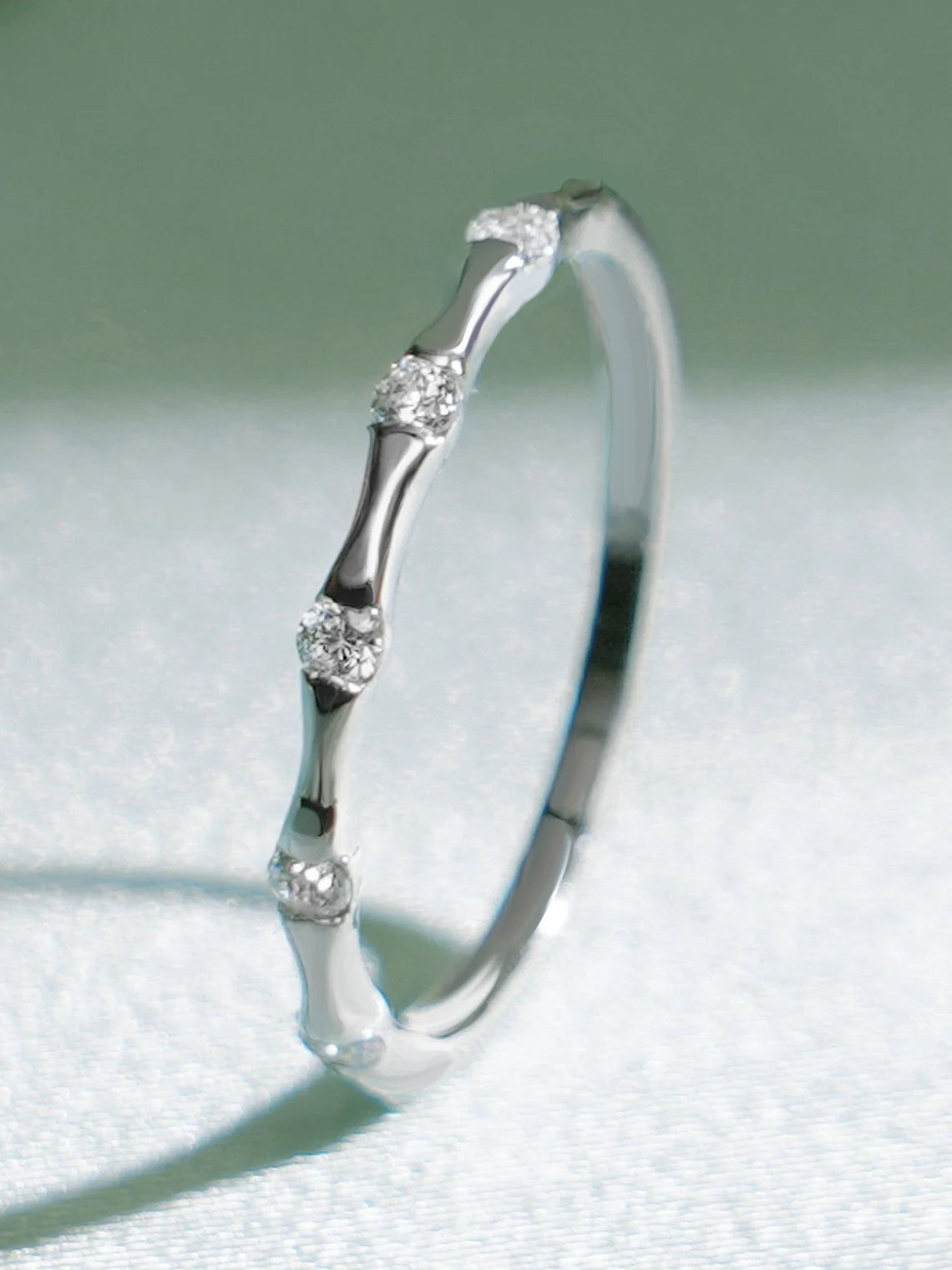 Twisted moissanite diamond band