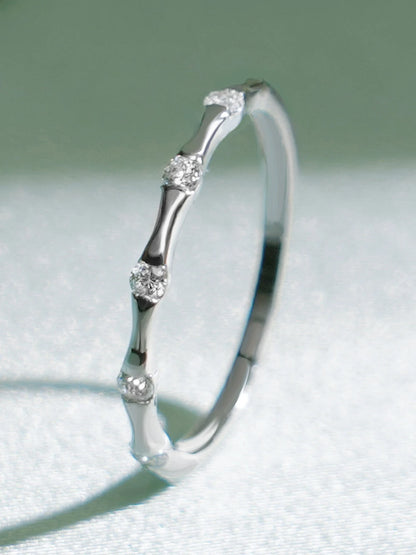 Twisted moissanite diamond band