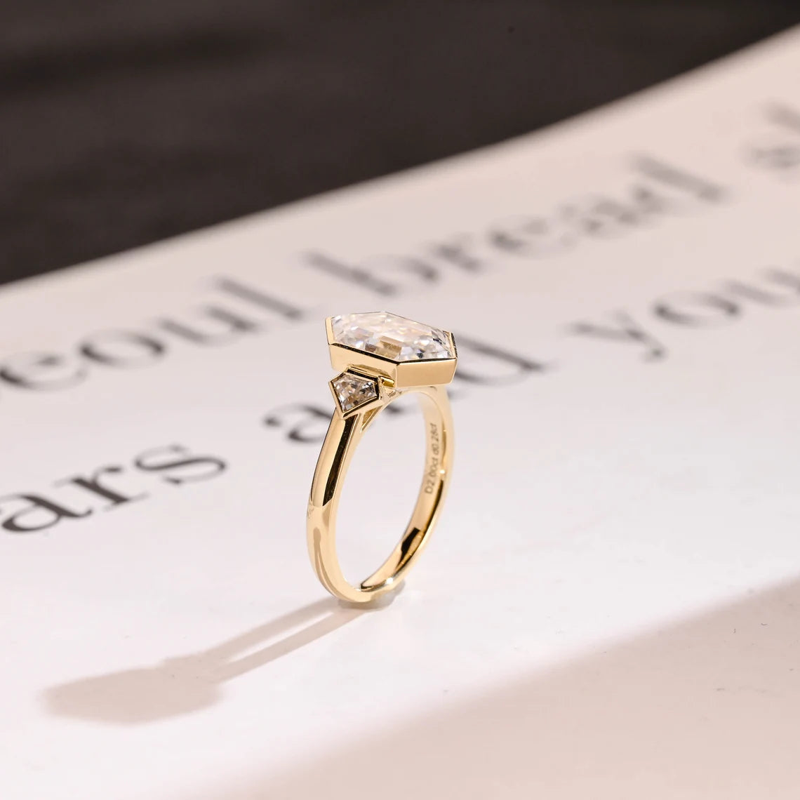 Pentagon side stone ring