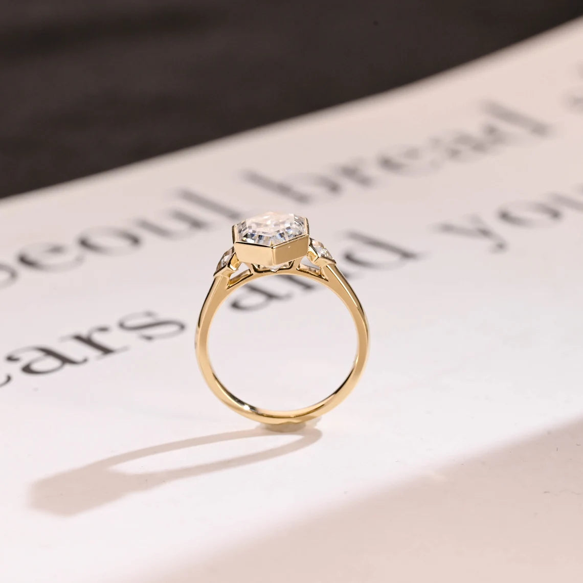 Bezel-set moissanite ring