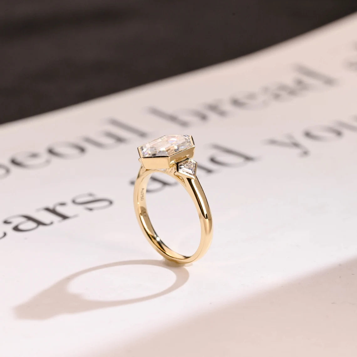 Three stone engagement ring