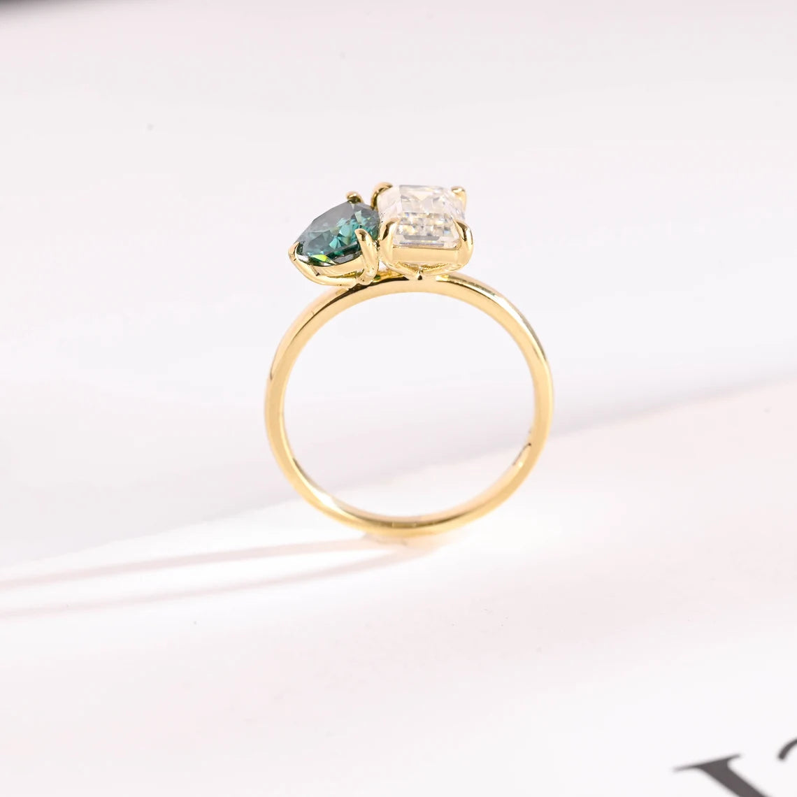 Emerald cut moissanite ring