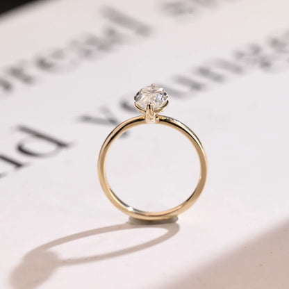 Moissanite solitaire ring
