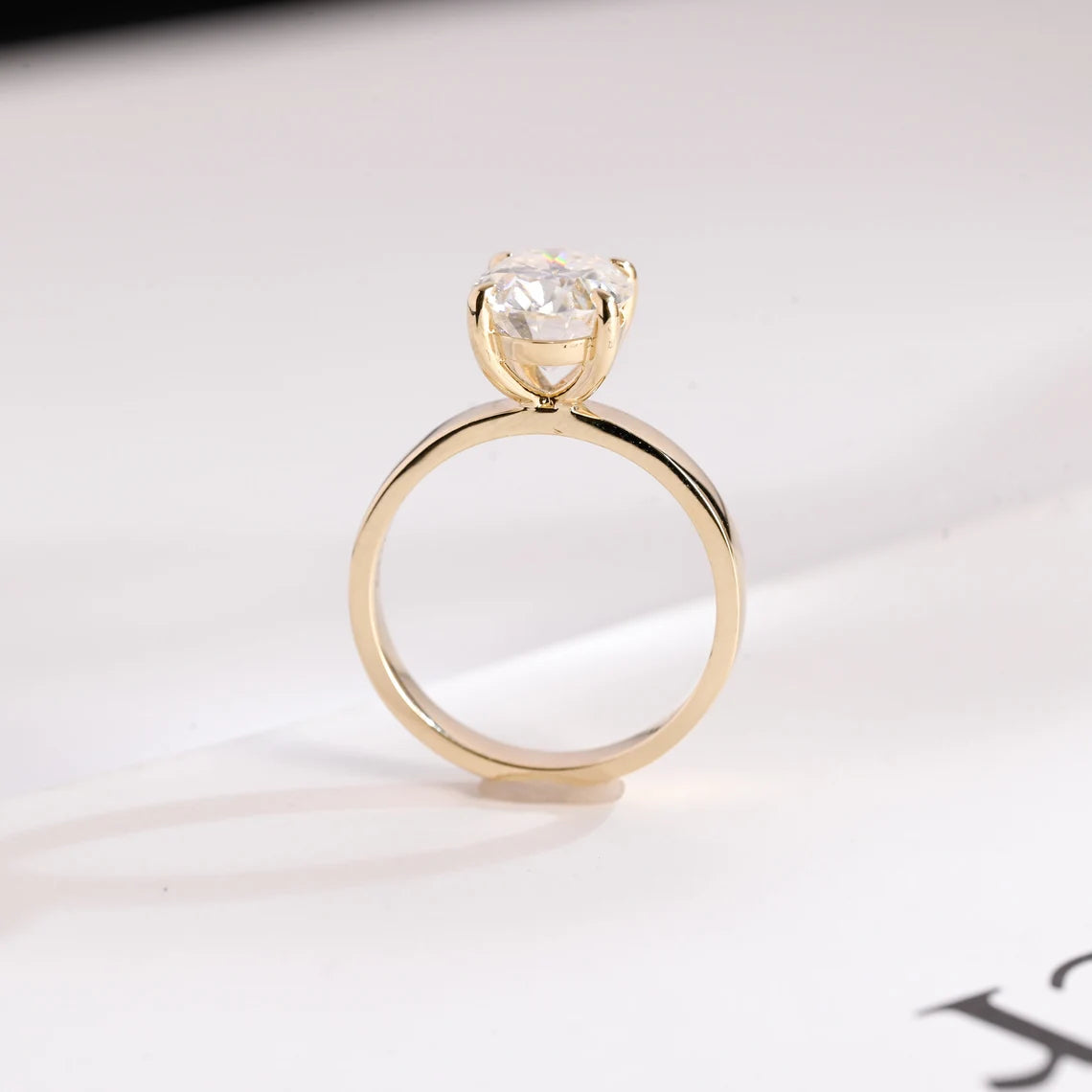 Shop Wide Band Oval Moissanite Diamond Engagement Ring—striking oval center stone and substantial wide band for luxury, comfort, and contemporary style.