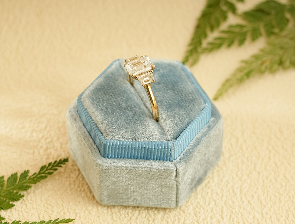Three stone engagement ring