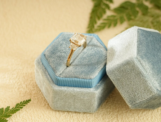 Emerald cut moissanite ring