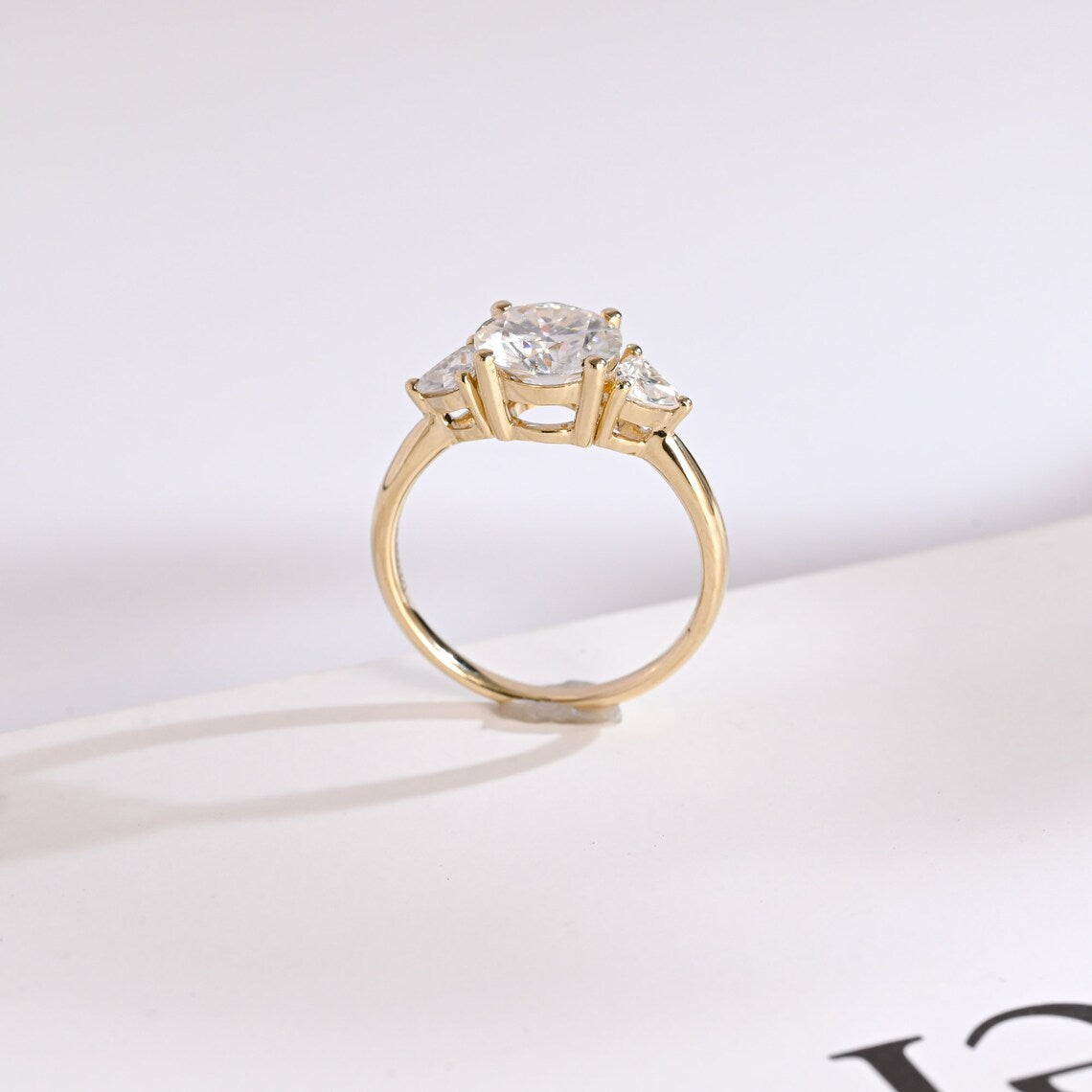 Trillion side stone ring