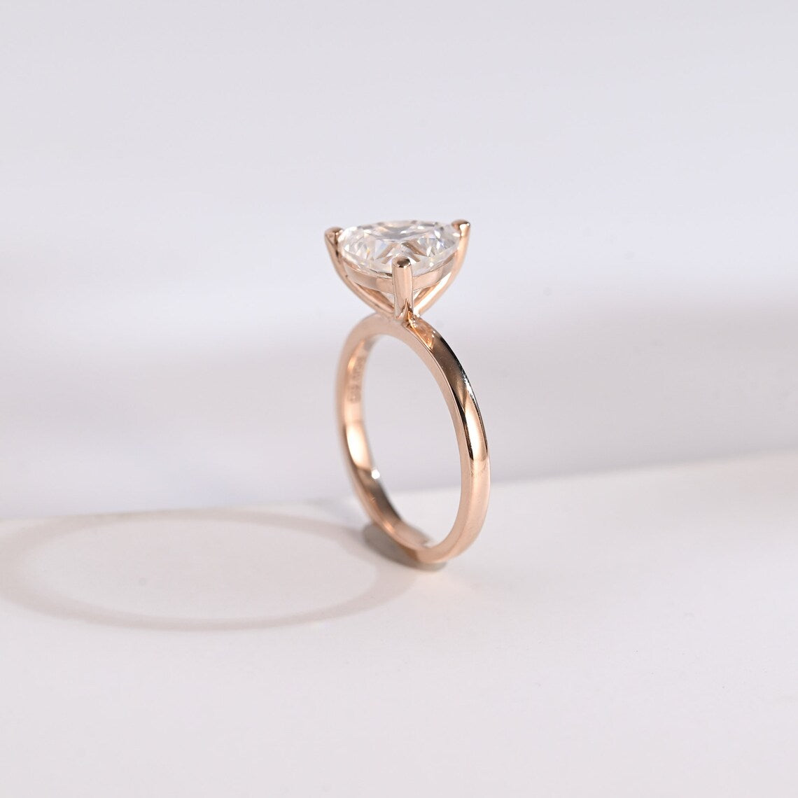 Straight shank solitaire ring