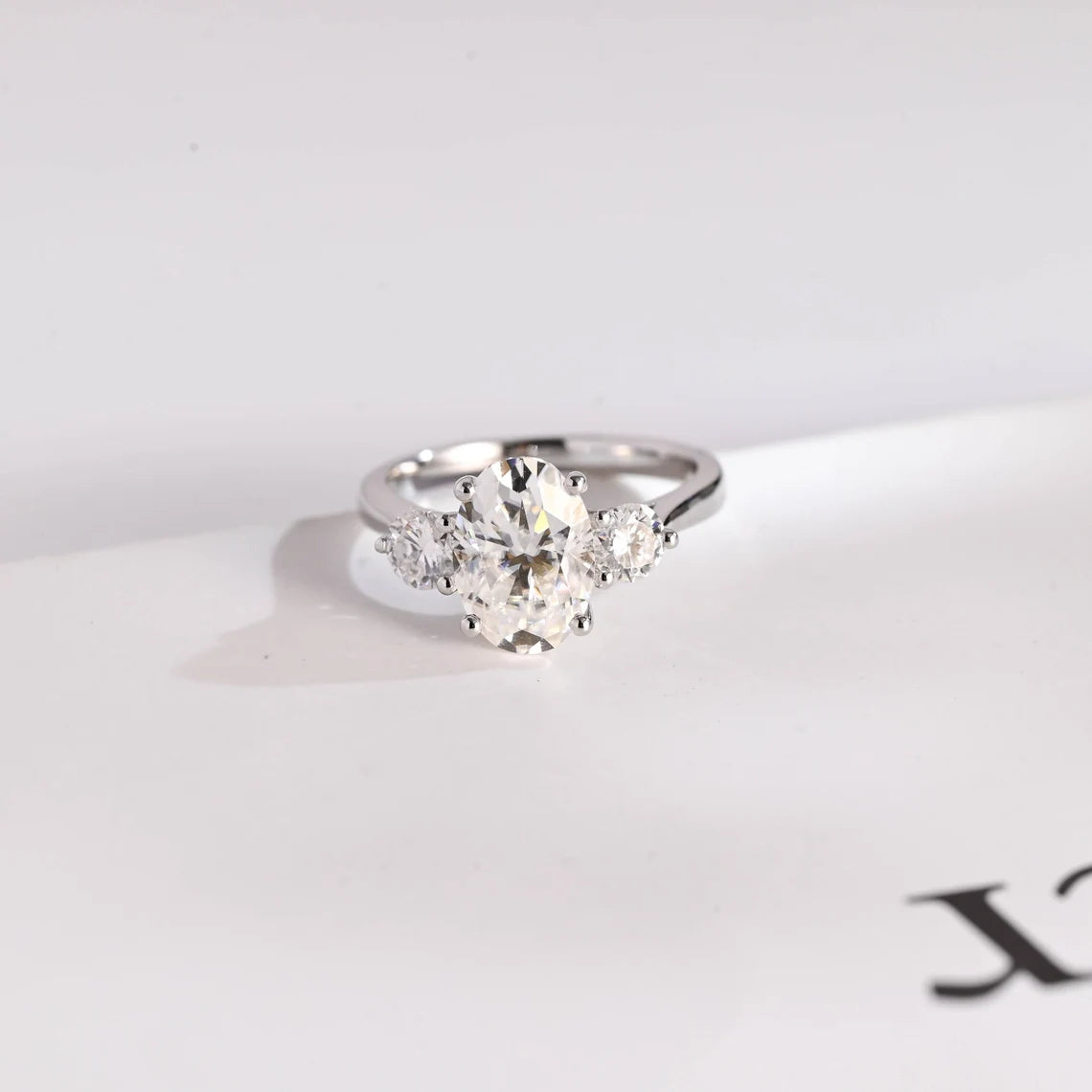 Three stone engagement ring