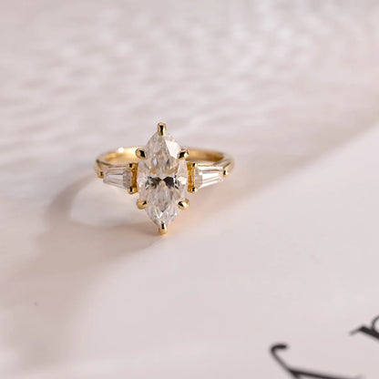 Three stone engagement ring