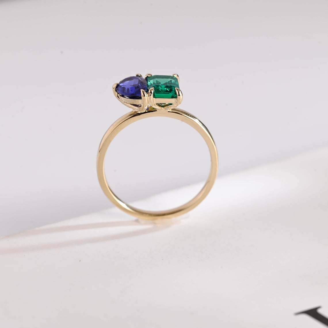 Blue pear cut moissanite ring