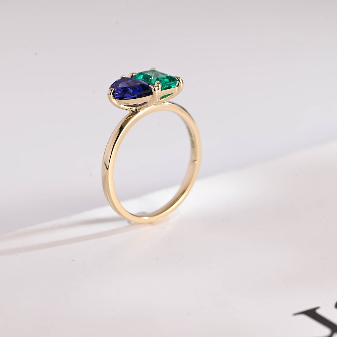 Green emerald cut moissanite ring