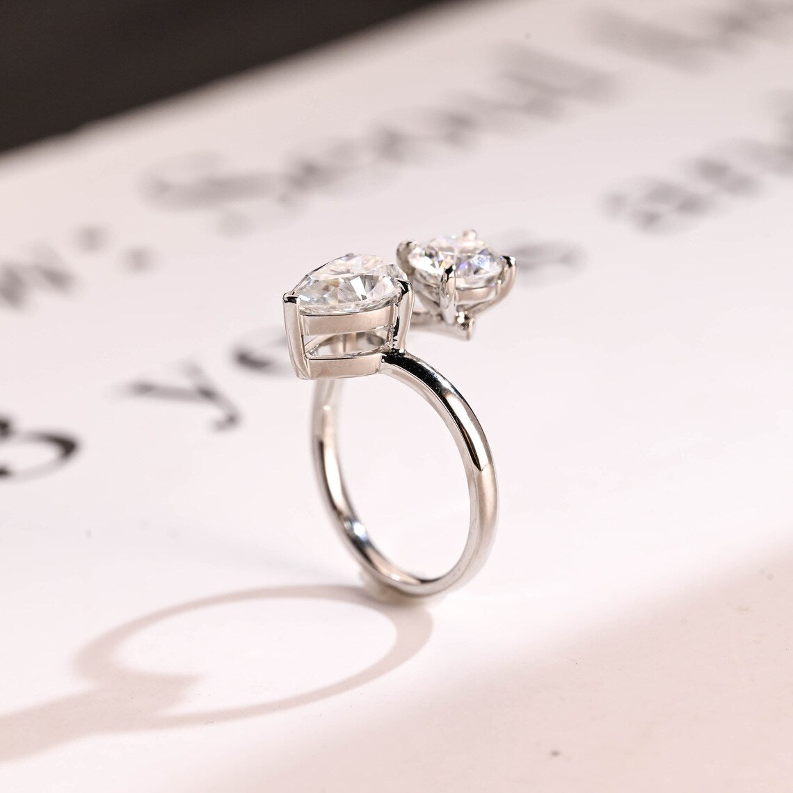 Round moissanite diamond ring