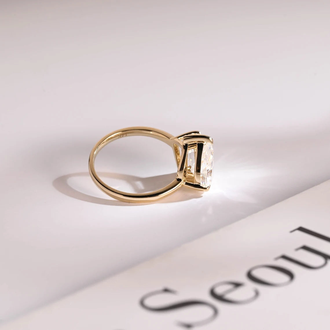 Yellow gold moissanite ring