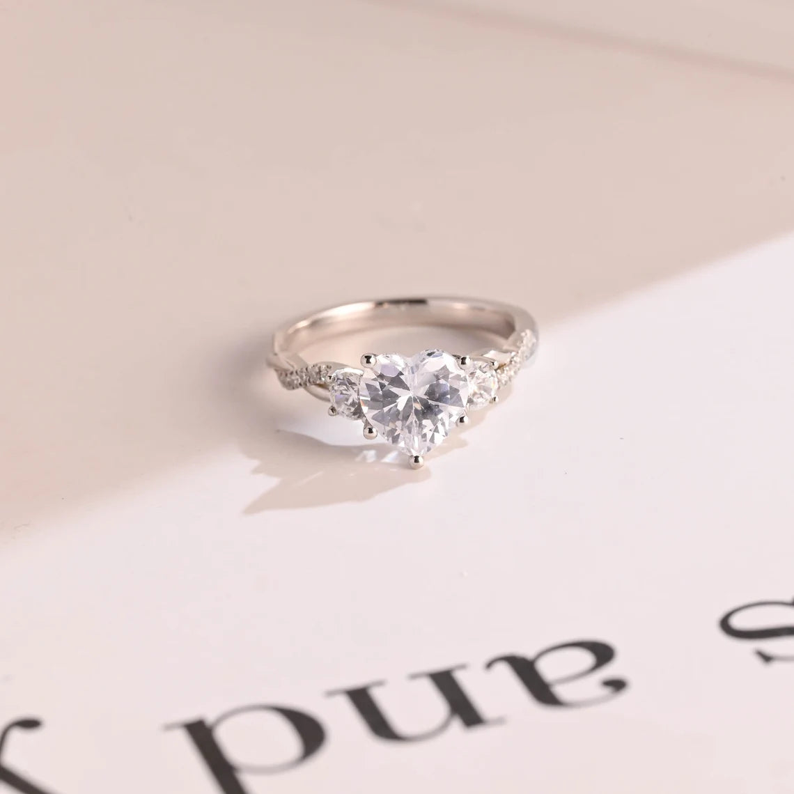 Three stone engagement ring