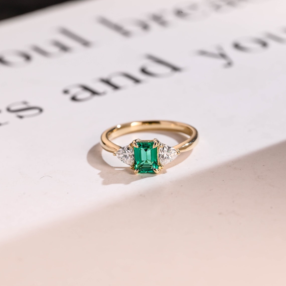 Green emerald cut moissanite ring