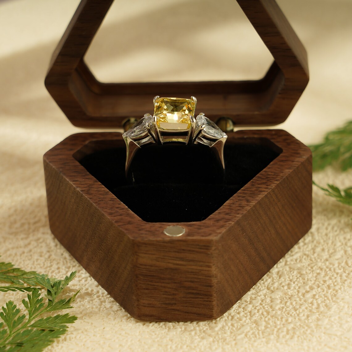 Three stone engagement ring