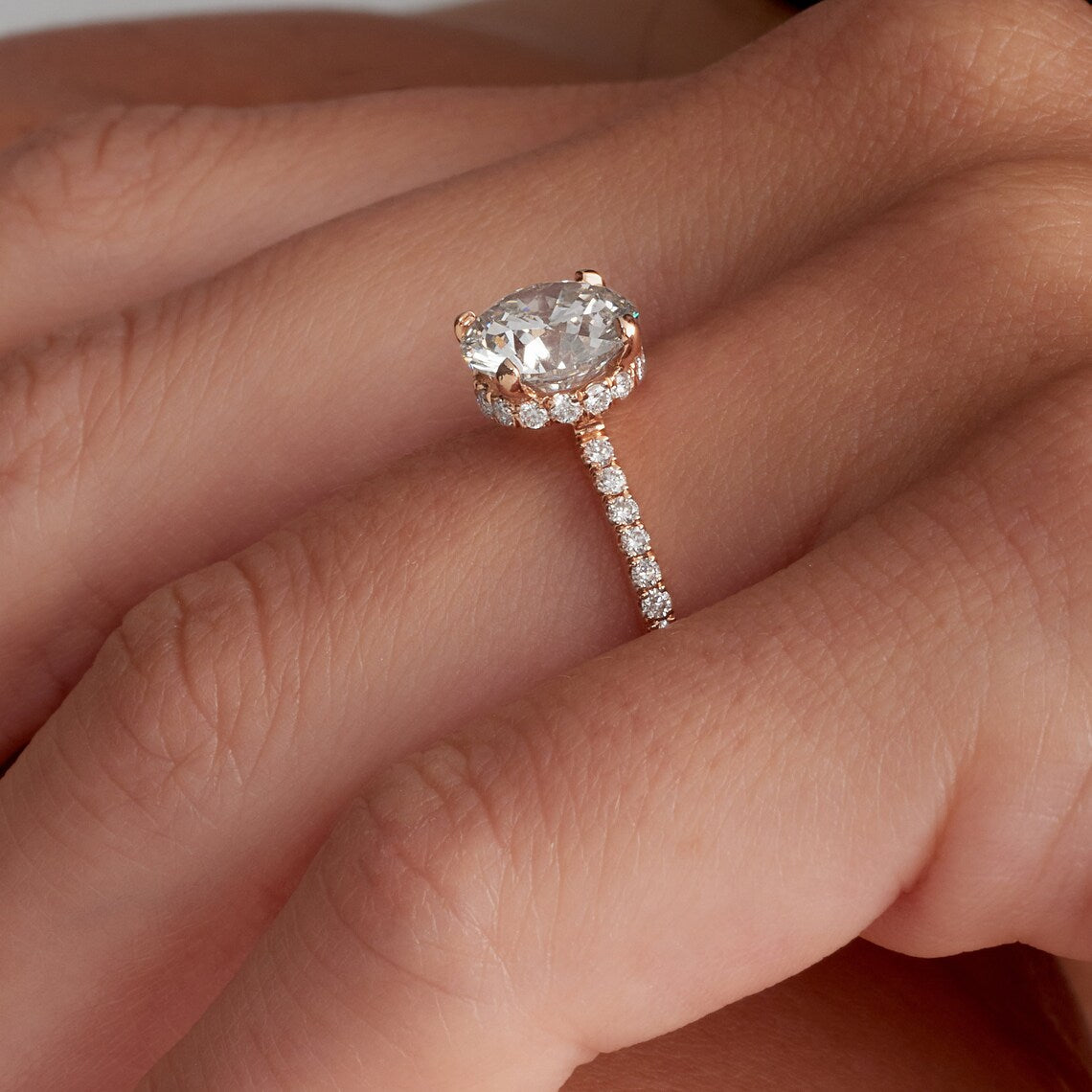 Hidden halo diamond ring