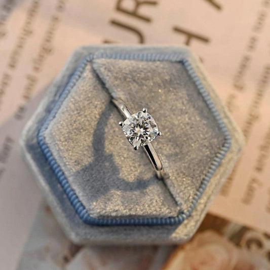 Solitaire cushion ring, Cushion diamond ring, Simple engagement ring, Moissanite cushion solitaire, Classic solitaire ring, Cushion cut bridal ring, Minimalist engagement ring, Moissanite cushion engagement, Elegant solitaire ring, Cushion promise ring, Solitaire moissanite bridal, Cushion cut wedding ring, Timeless solitaire ring, Solitaire diamond ring, Moissanite engagement solitaire, Cushion cut moissanite bridal, Solitaire anniversary ring, Cushion solitaire diamond