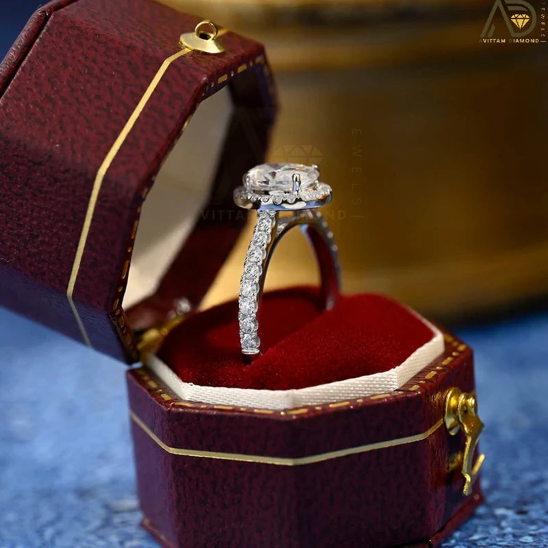 Discover our stunning 1.0 CT oval cut moissanite ring featuring a beautiful halo design and pave setting. The perfect anniversary gift for your loved one!