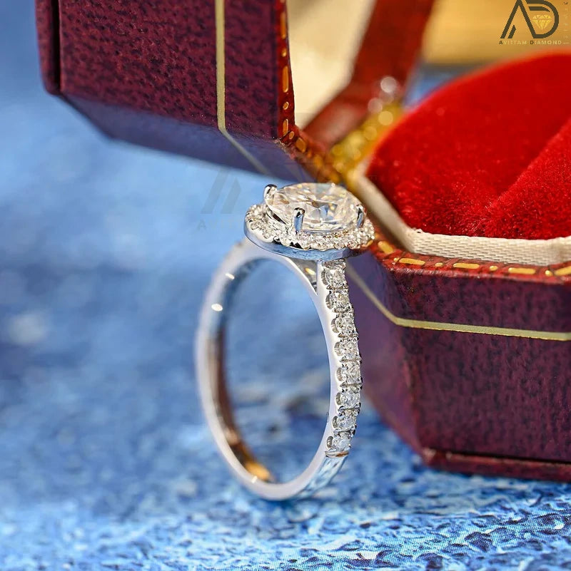 Discover our stunning 1.0 CT oval cut moissanite ring featuring a beautiful halo design and pave setting. The perfect anniversary gift for your loved one!