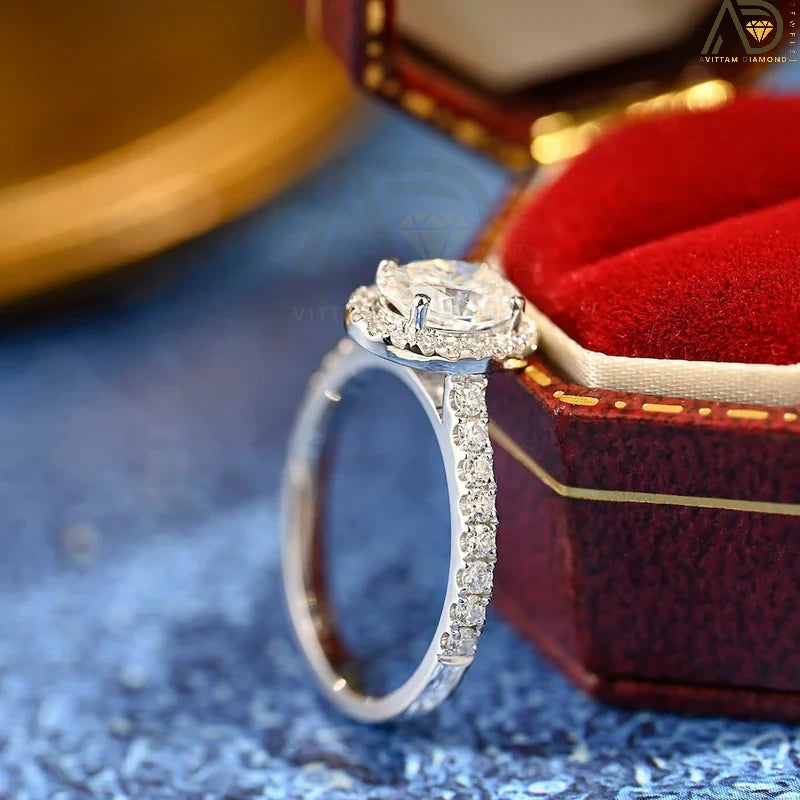 Discover our stunning 1.0 CT oval cut moissanite ring featuring a beautiful halo design and pave setting. The perfect anniversary gift for your loved one!